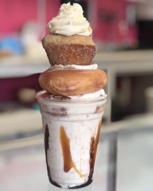 Milkshake with donut and cupcake on top