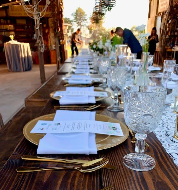 Fine dining dinner table set up for group set up in rustic bar