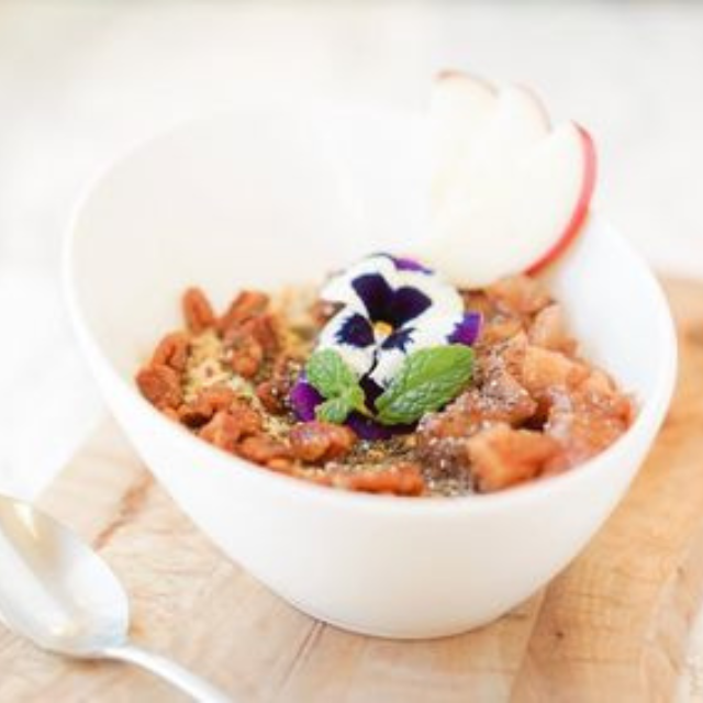 Bowl of Muesli with a flower from Bellden Cafe in Bellevue, WA