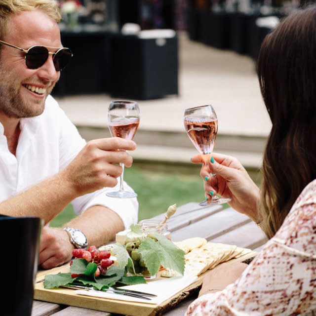 couple drinking Tinwood Estate Sussex Sparkling wine