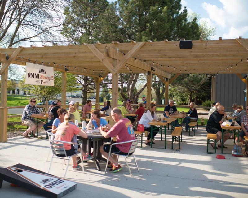 Beer drinkers enjoying the spring day on the OMNI patio