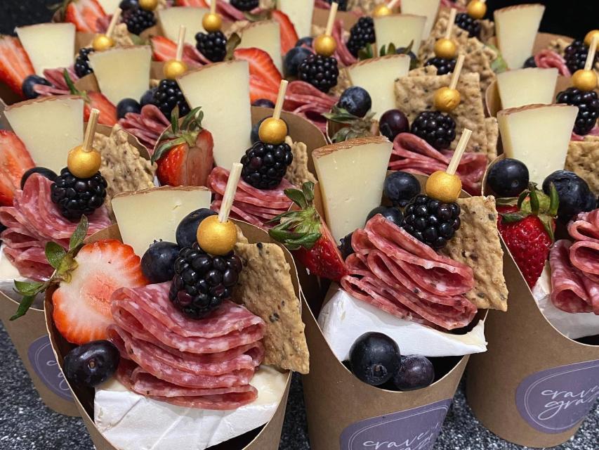 Charcuterie cups with berries, cheese, and salami—grab-and-go bites.