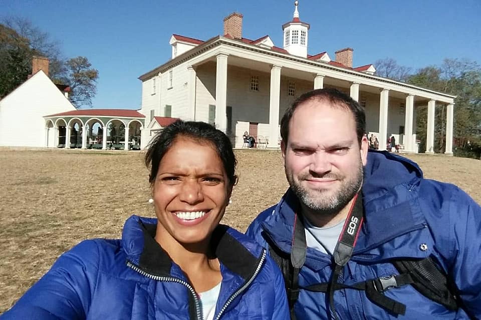 Selfie of a couple in front of the Mount Vernon Estate East Lawn