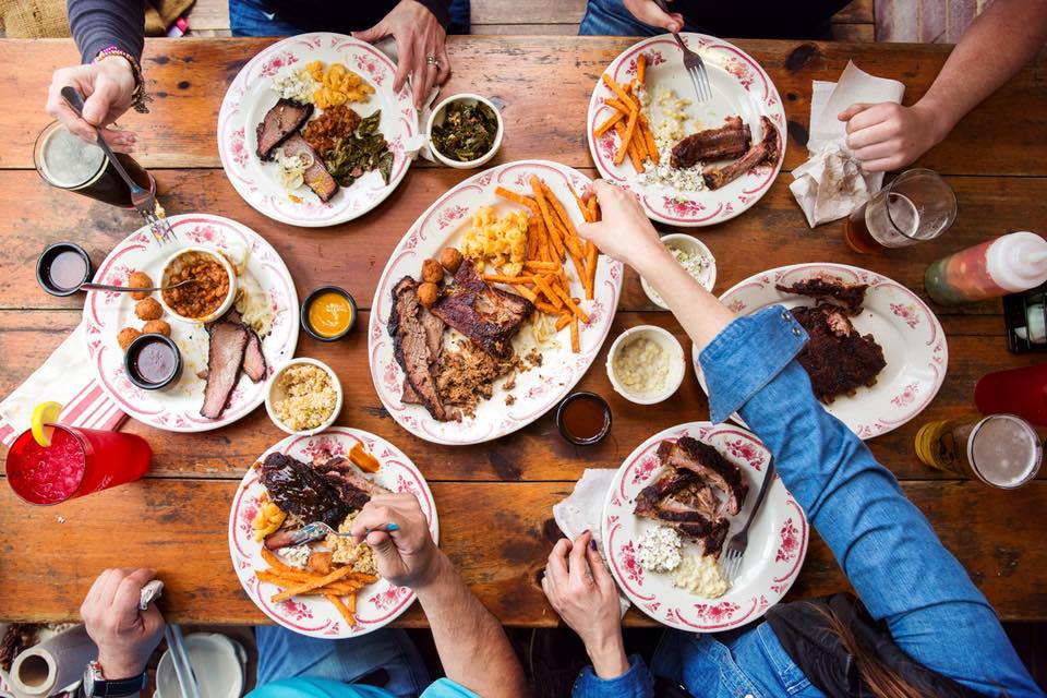 An aerial view of different meals from Midwood bbq