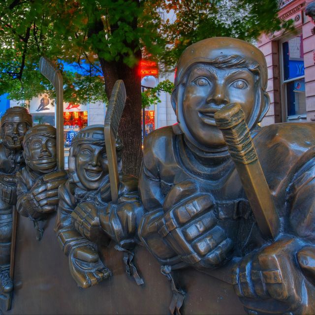 Hockey player statues outside the Hockey Hall of Fame