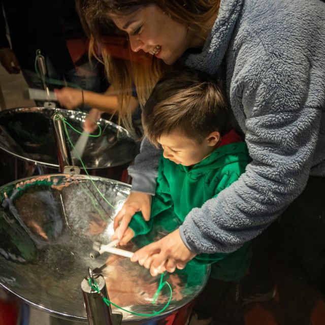 A family explores the interactive exhibits at the Ontario Science Centre