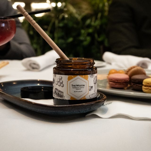 Westin Harbour Castle Honey with desserts and drinks around on a table