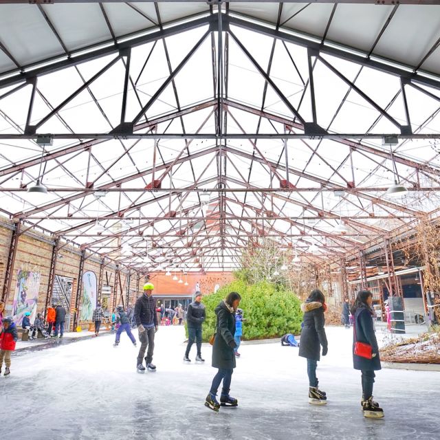 People skate on the free public rink at Evergreen Brick Works