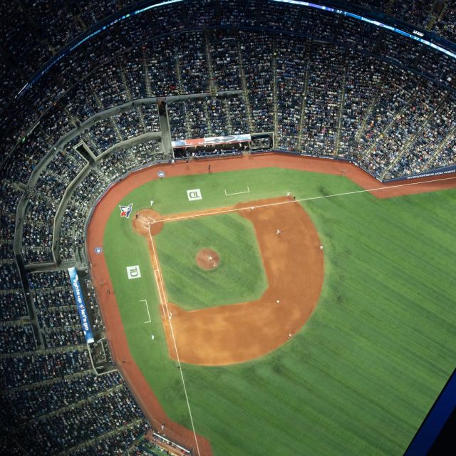 Blue Jays game at Rogers Centre in Toronto with open dome at night