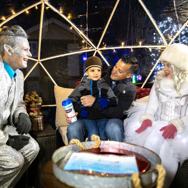 Dad and son meeting characters at Canada's Wonderland Winterfest