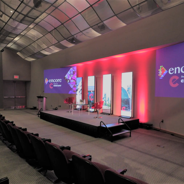 Theatre-style seats facing a stage and front of the room at Enercare Centre's StudioEX in Toronto
