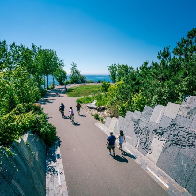 The Ravine at Trillium Park in Ontario Place is the gateway to the park, two beautiful stone walls connected by a bridge that frames views of Lake Ontario. Developed in collaboration with the Mississaugas of the New Credit First Nation, the Ravine walls celebrate First Nations’ heritage and culture with the moccasin identifier engraved into the stone, a visual reminder to recognize and honour the past.