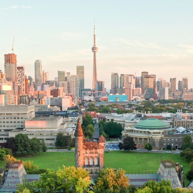 UofT Campus Aerial at sunset with Toronto skyline behind