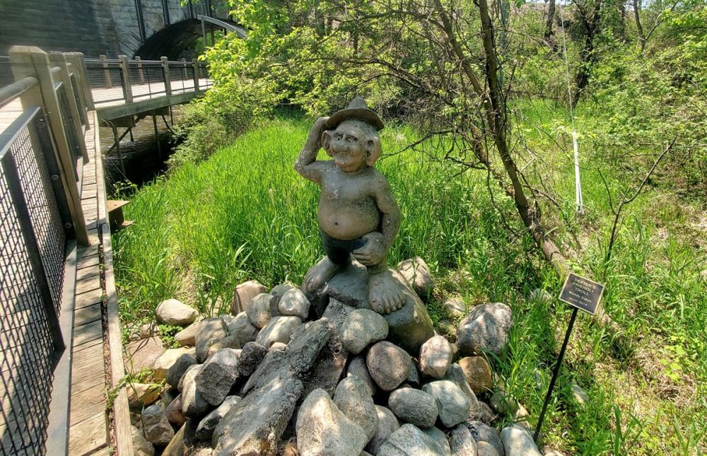 Troll sculpture located in Dexter next to border to border trail outside