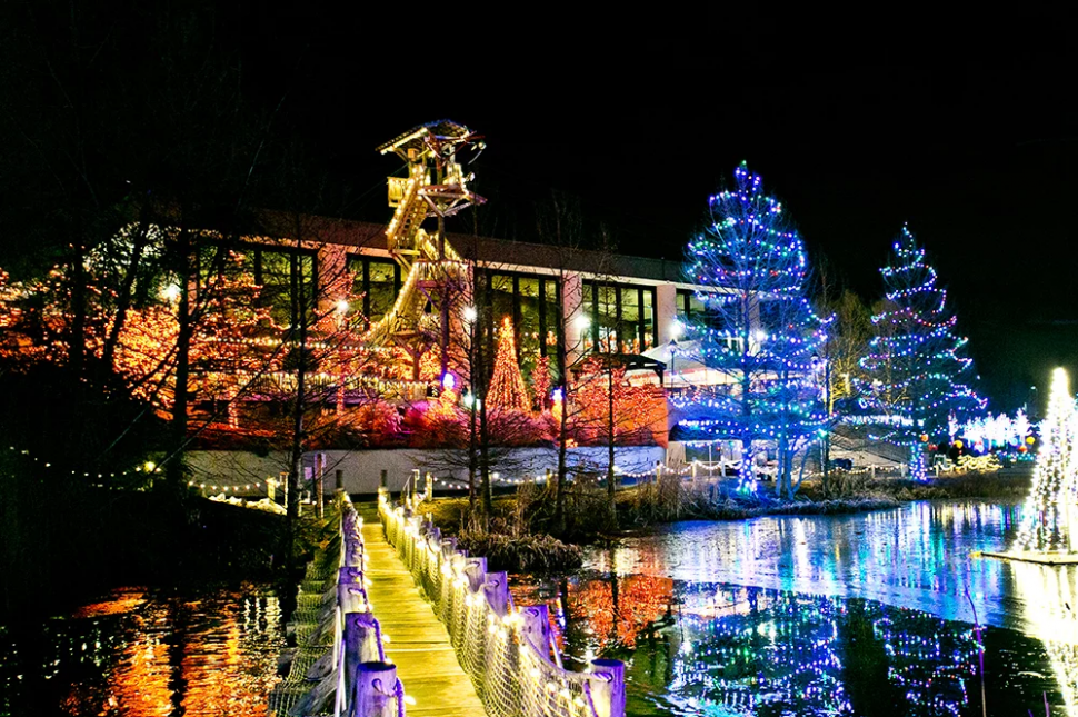 Exterior of Creation Museum lit up with holiday lights for ChristmasTown event.