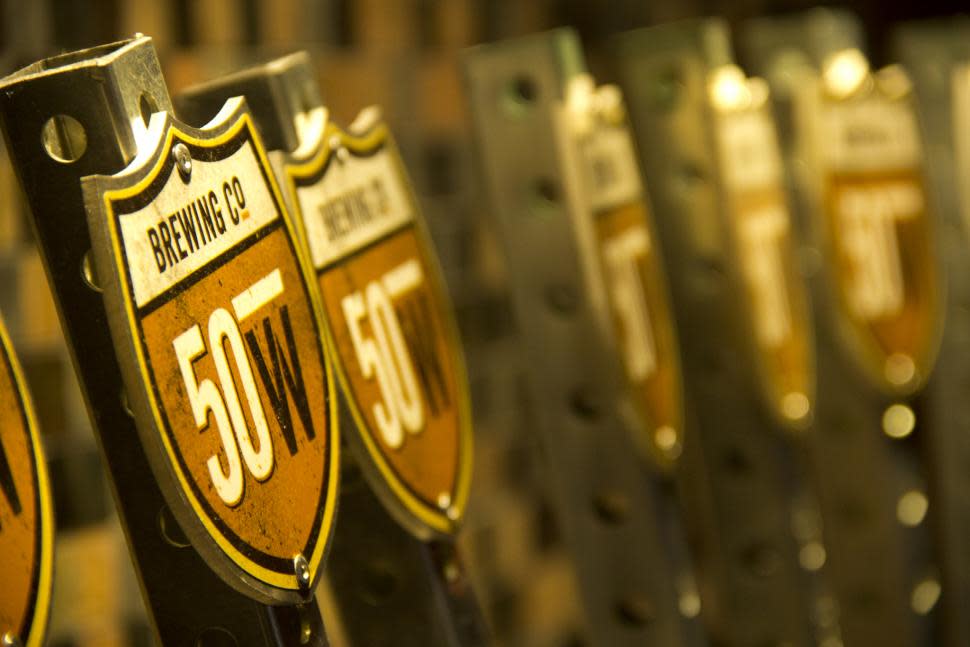 Fifty West Production Works (photo: Fifty West Brewing Co.) Beer taps at Fifty West Production Works (photo: Fifty West Brewing Co.)