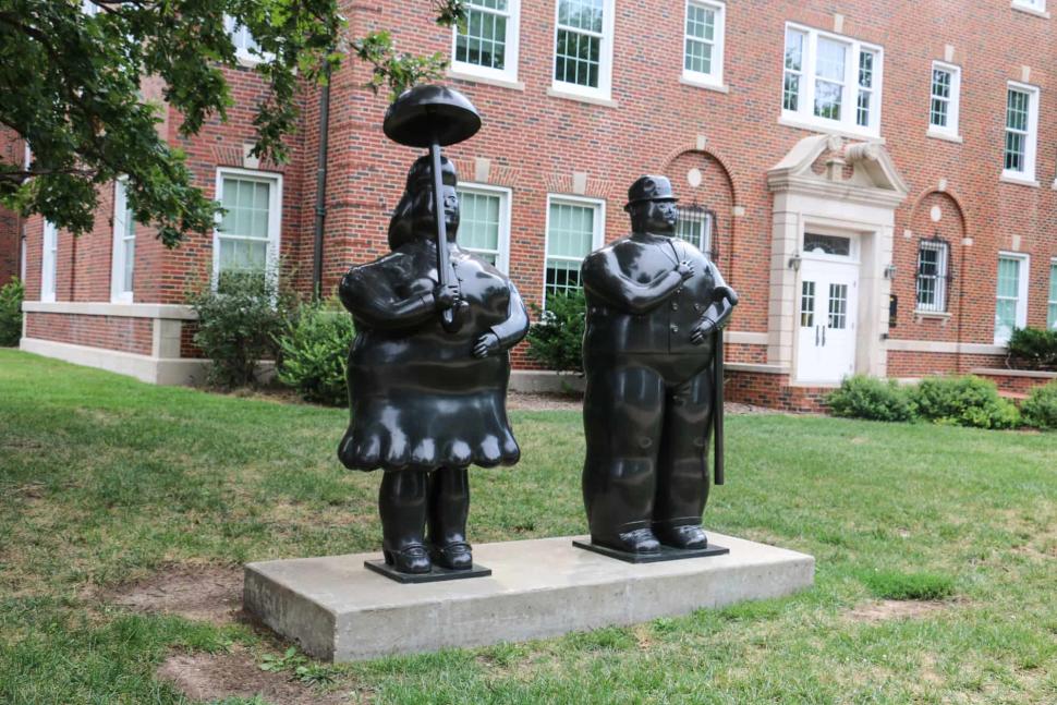 Woman with Umbrella and Man with Cane From The Martin H. Bush Outdoor Sculpture Collection in Wichita, KS