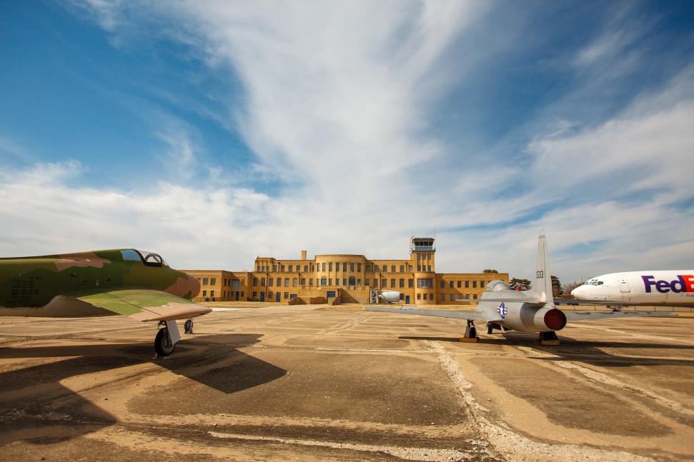 Kansas Aviation Museum with Planes in Foreground