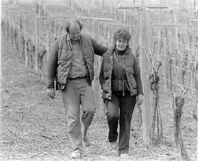George & Trudy Heiss walking amongst their vines at Gray Monk Winery