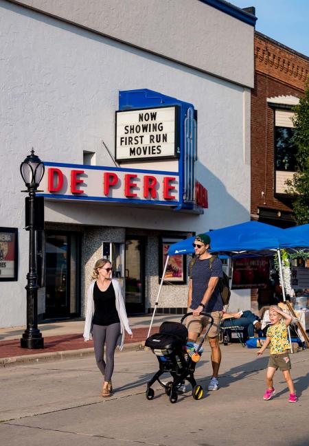 Family walking at De Pere Farmers Market