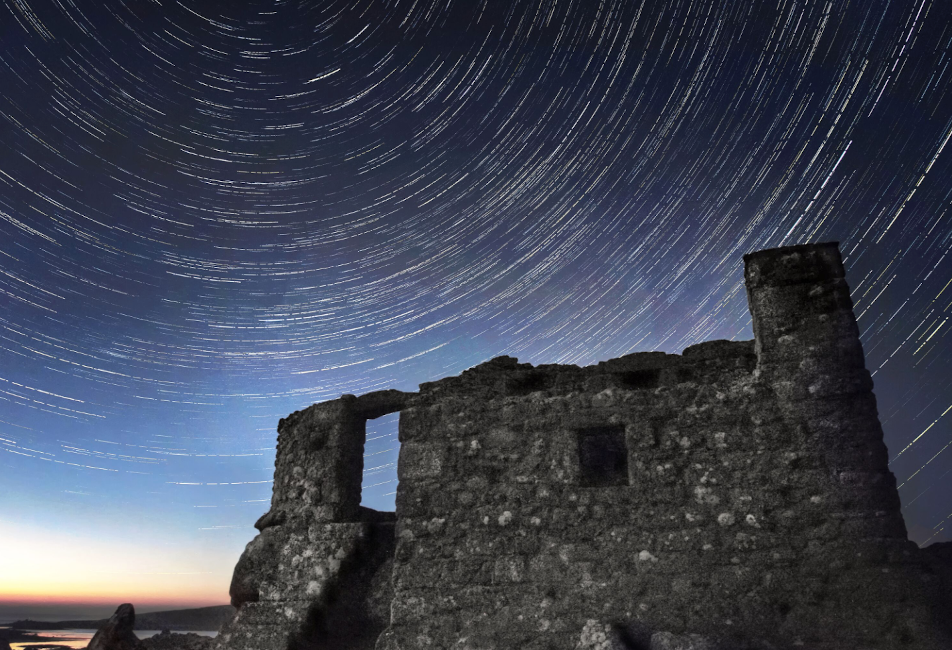 IOS Nav Landscape Large - Blog - Dark Skies - ruin beneath stars - 952x650