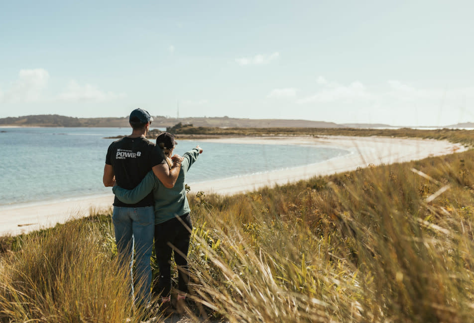 A couple enjoying the views on Scilly in autumn