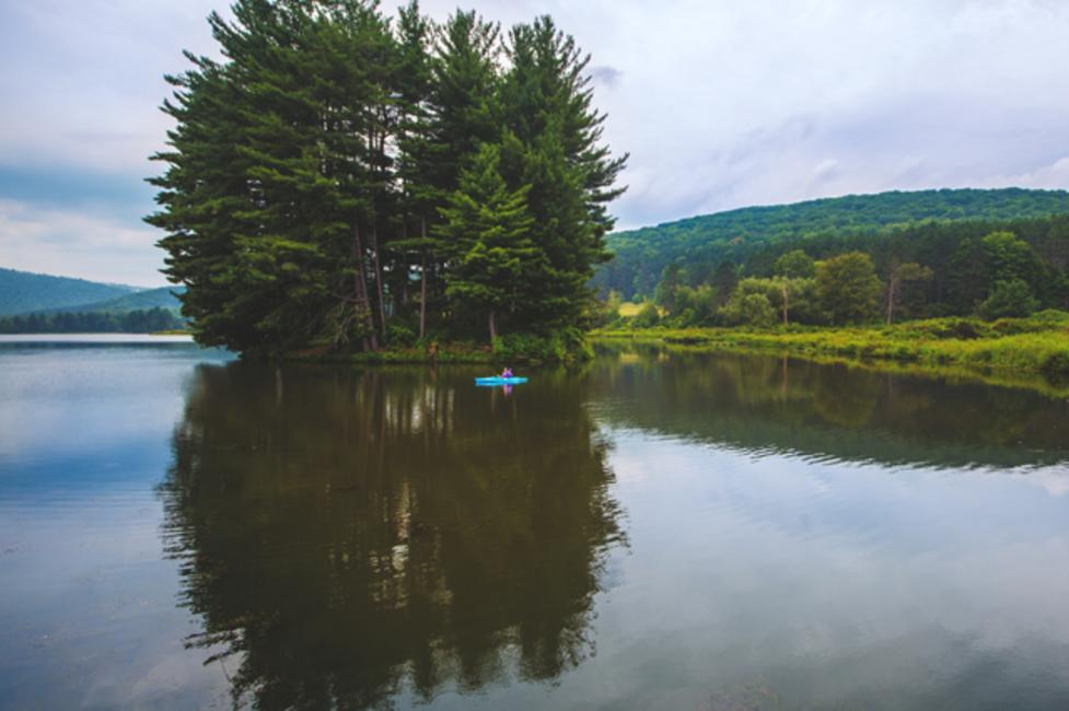 Allegany State Park A lone kayaker on the lake at Allegany State Park