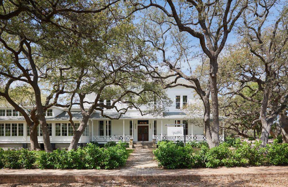 Matties at Green Pastures exterior under live oaks