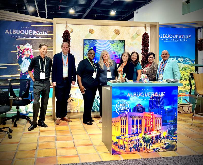 The Visit ABQ team poses in the Visit ABQ booth at Connect Marketplace 2024.