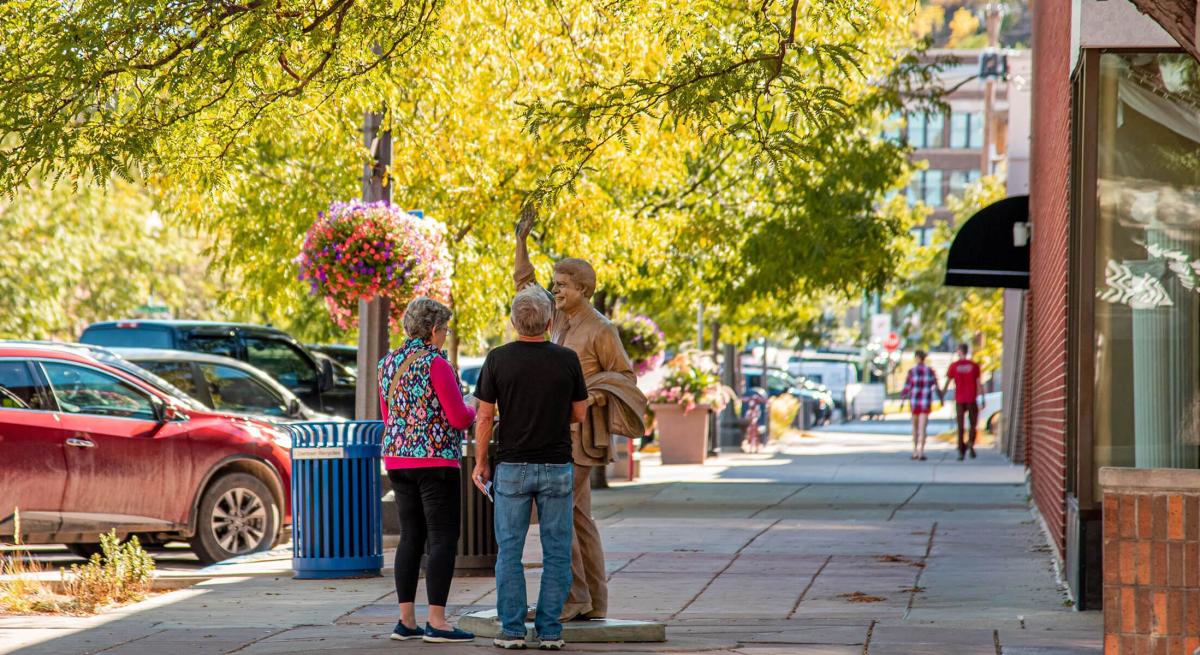 Couple looking at Jimmy Carter Statue in Downtown Rapid City, SD