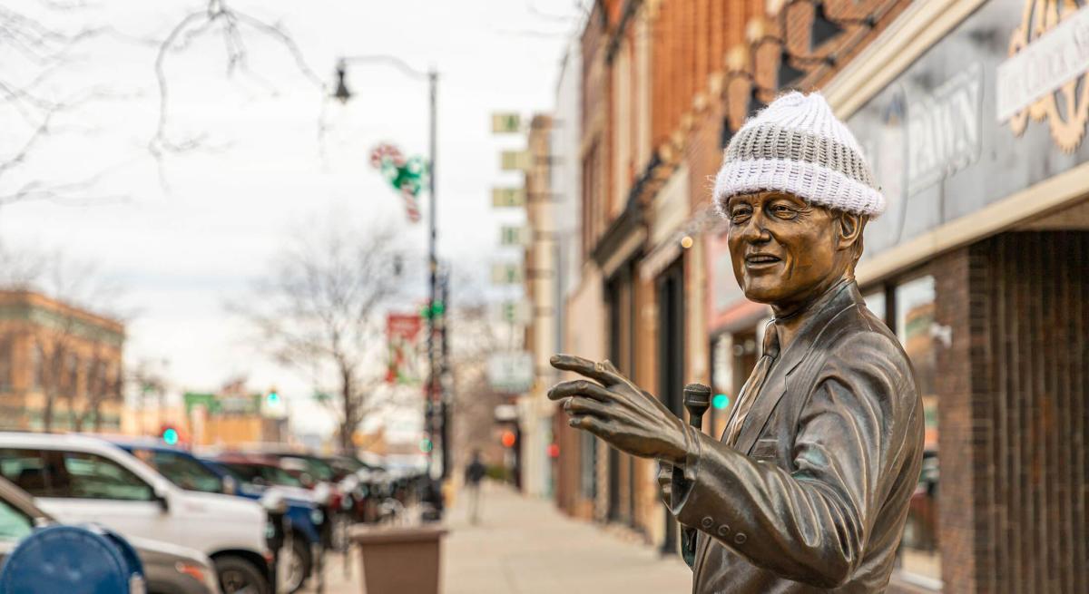 City of Presidents statue Bill Clinton wearing winter gear in downtown Rapid City, SD