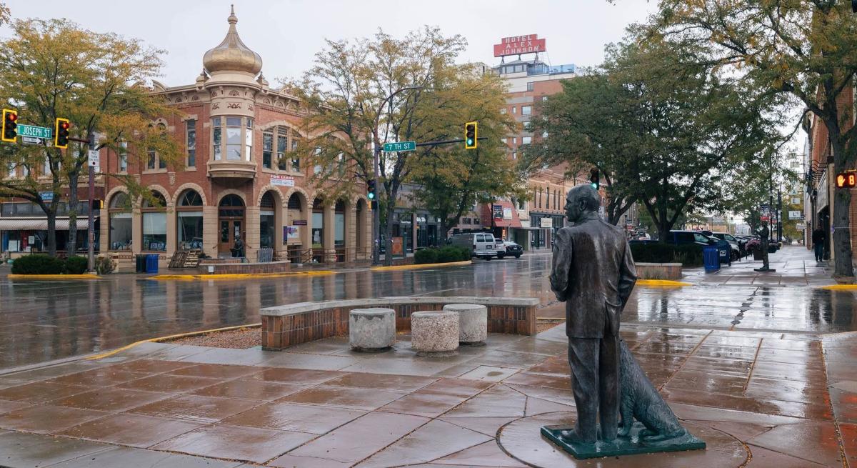 Rainy day in downtown rapid city featuring president ford statue