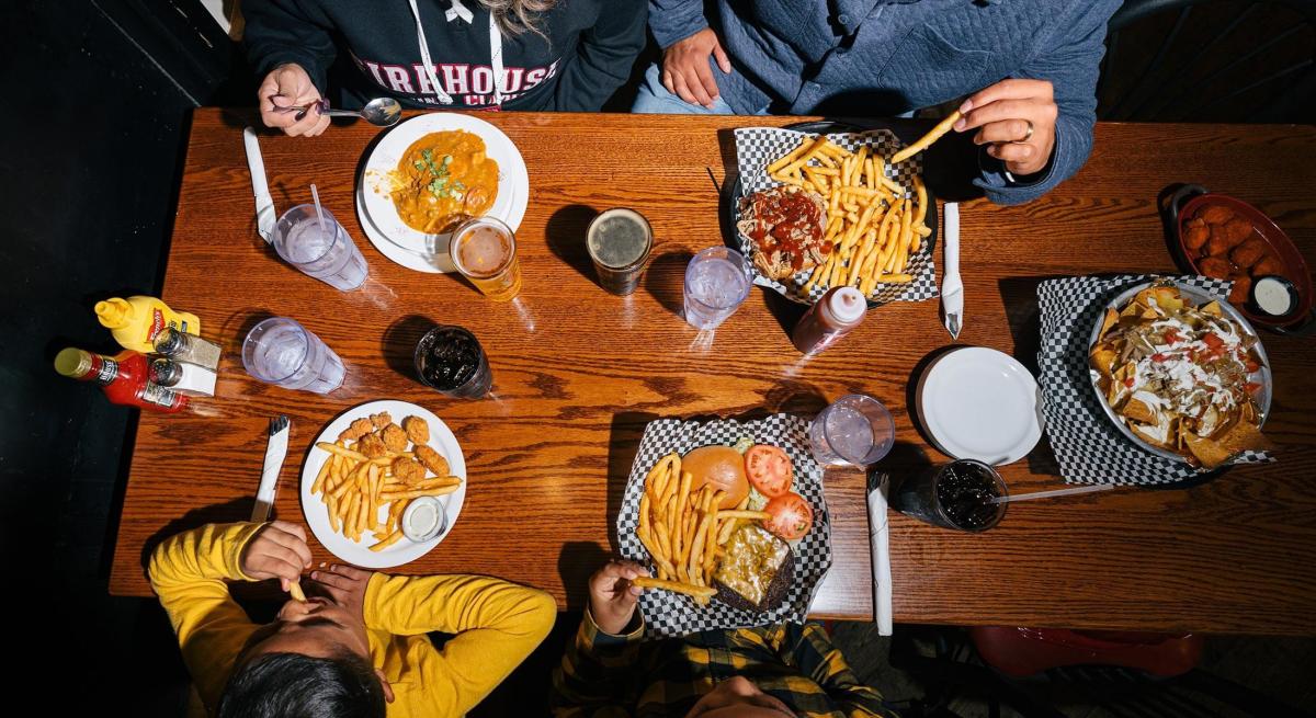 Overview of a table full of food from the Firehouse Brewing Company Menu in Rapid City, South Dakota