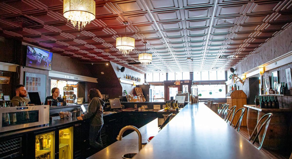 interior of firehouse winery with bar top and seating