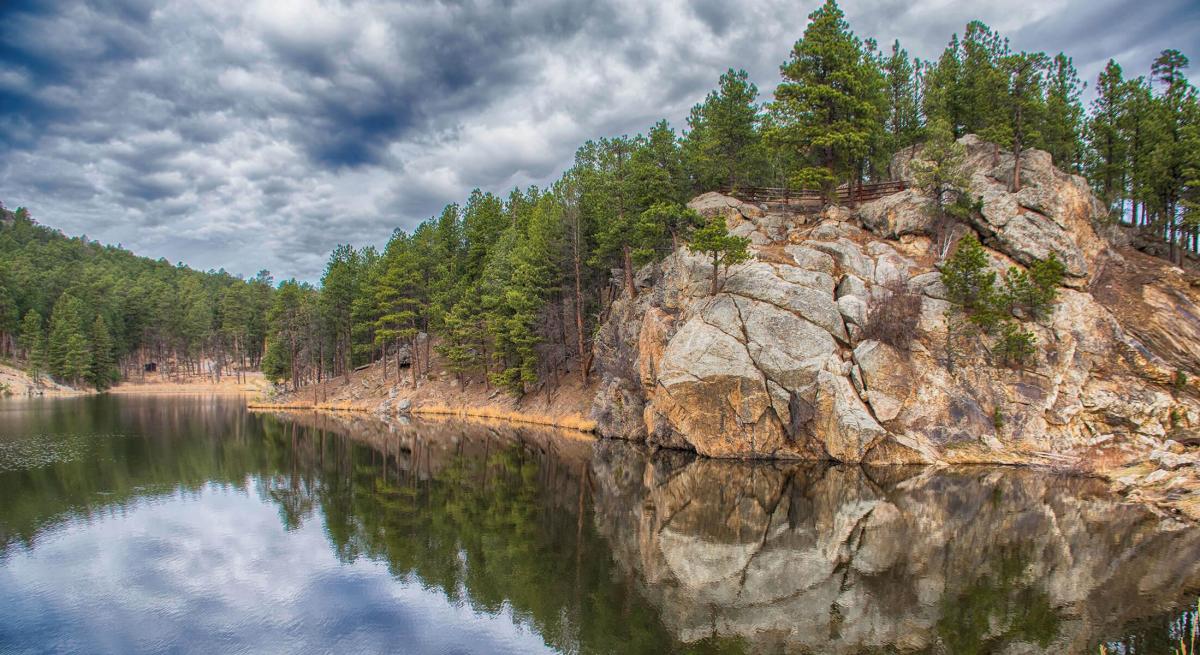 horsethief lake reflection with cloudy sky near mount rushmore in the black hills of south dakota