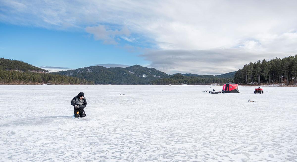 ice fishing crew out on sheridan lake in the black hills of south dakota