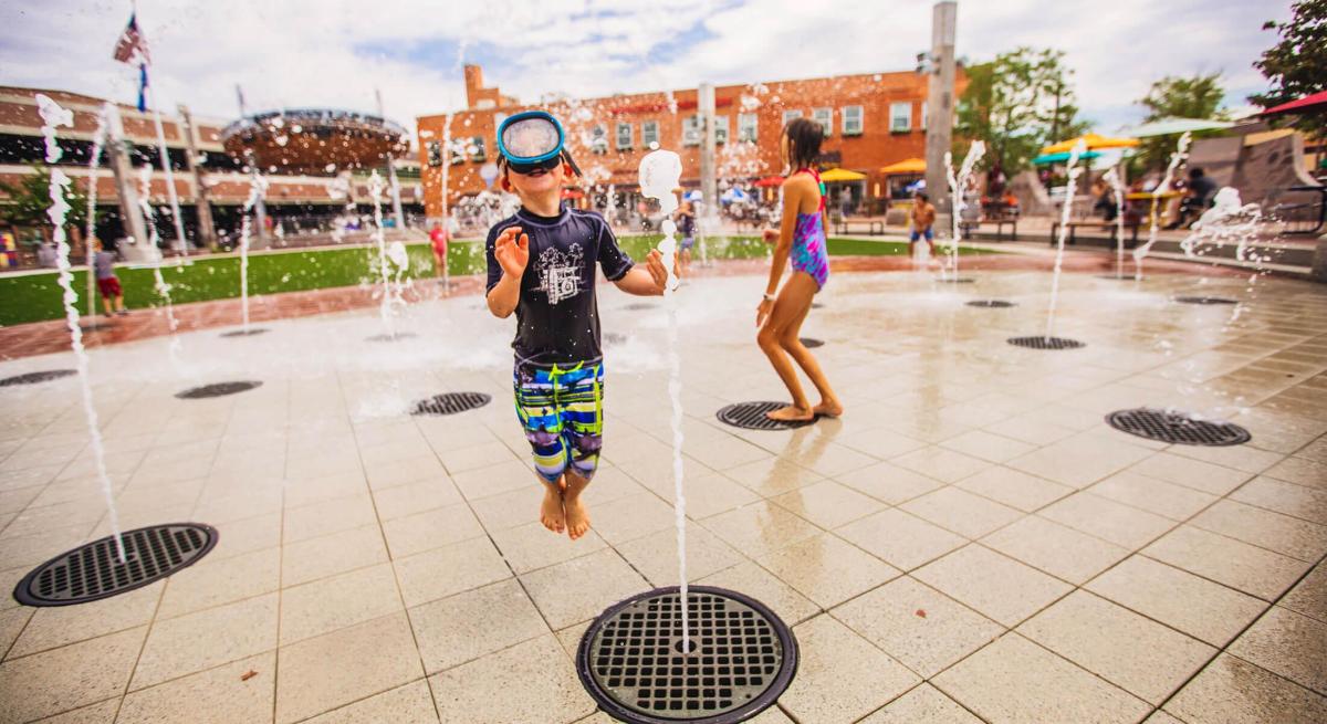 Kids playing in the Main Street Square Fountains