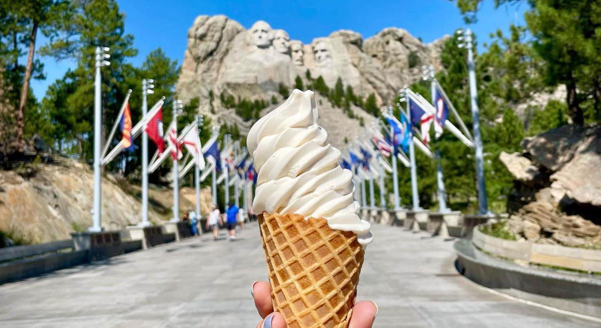 cone of thomas jefferson ice cream in front of mount rushmore national memorial