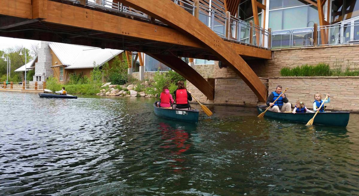 Family canoeing class taking place at the outdoor campus west in rapid city