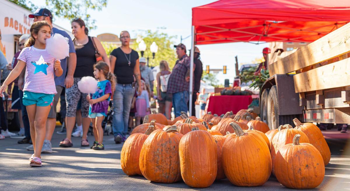 People shopping local vendors during the Downtown Rapid City Pumpkin Festival