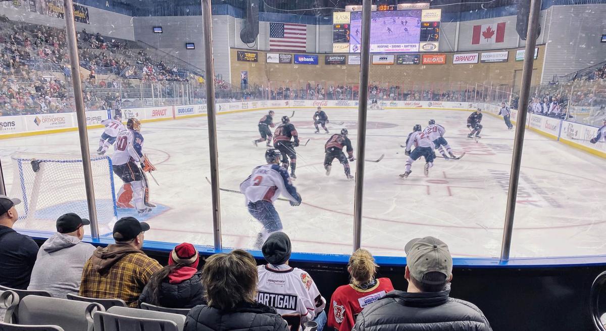 Rapid City Rush Hockey Game with Fans Cheering them on