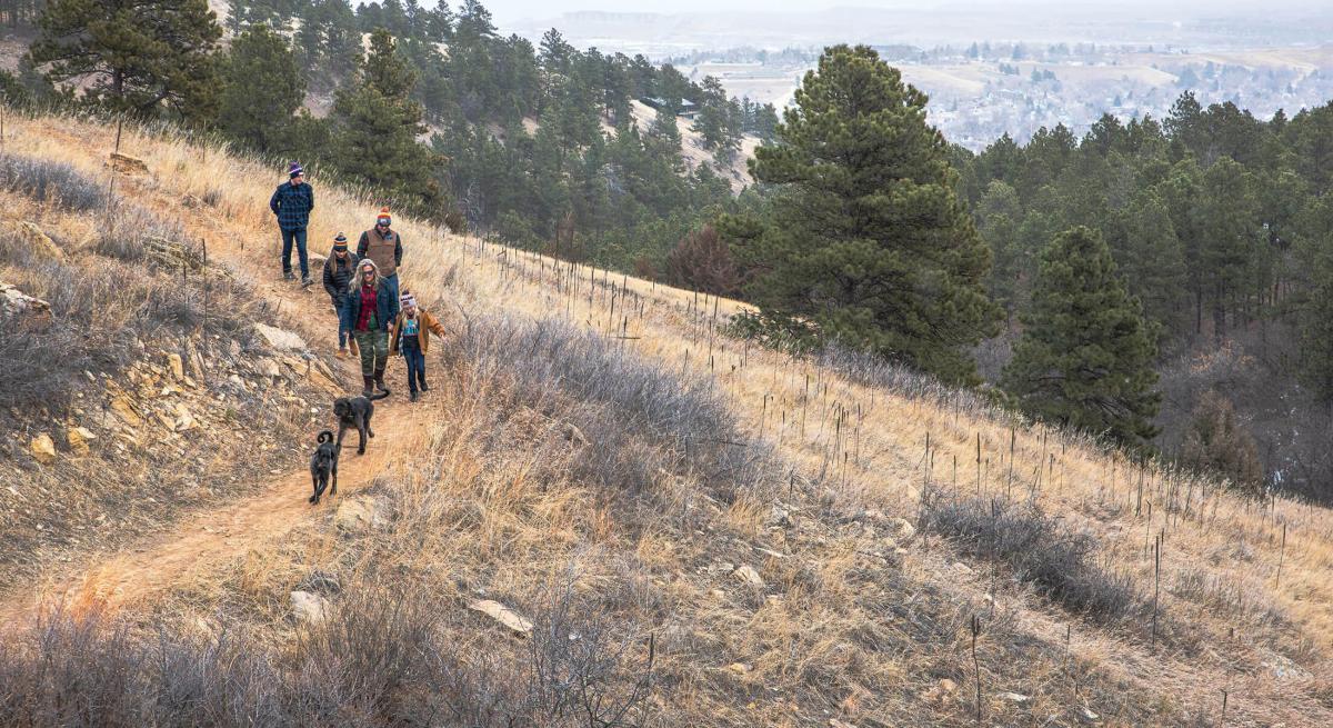 Family hiking the trails of skyline wilderness area in rapid city south dakota