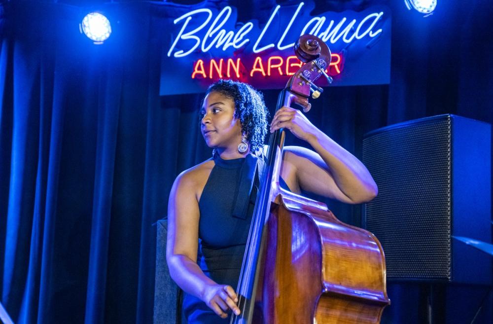 Musician performs at blue llama jazz club