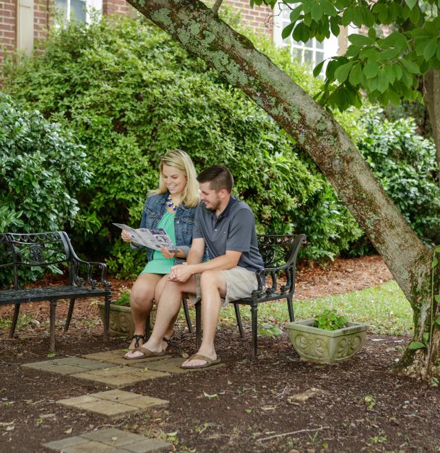 Visitors With Brochure in Milledgeville