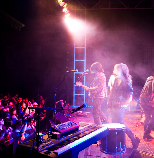 Band on stage at Deep Roots Festival in Milledgeville