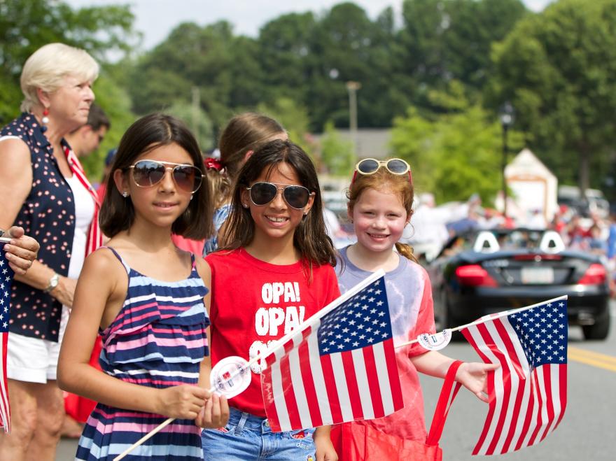 Girls With American Flags At The 4th of July Parade In Dunwoody, GA