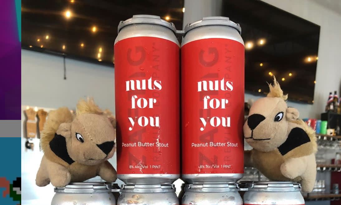 Cans of Zaftig's Nuts for You beer with stuffed squirrels
