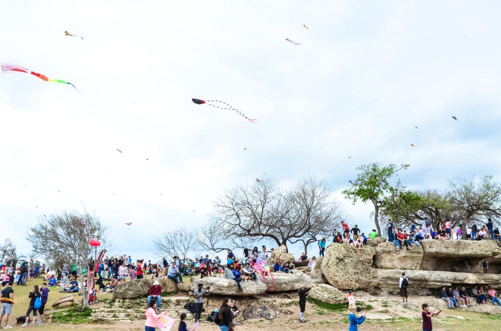 Attendees enjoying the ABC Kite Fest at Zilker Park