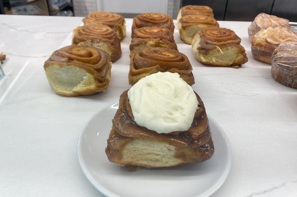 GK Bakery Cinnamon rolls lined up in the display case