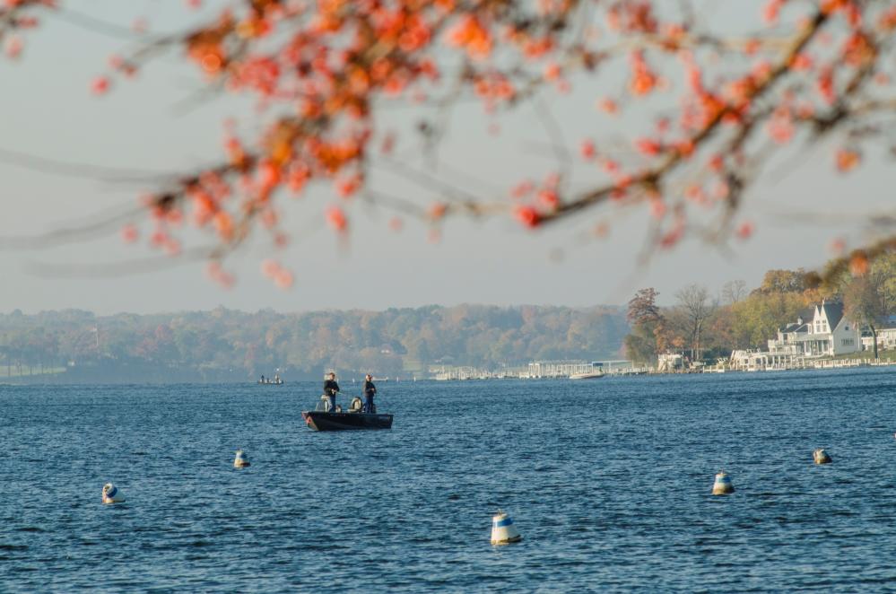 Fisherman casting a line on Geneva Lake